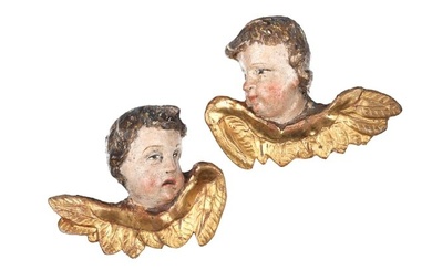 Pair of winged putti heads, South German, mid 18th century