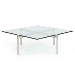 Poul Kjærholm: “PK 65”. Coffee table with chromed steel frame. Square top of clear glass. Designed 1979. Manufactured by Fritz Hansen.