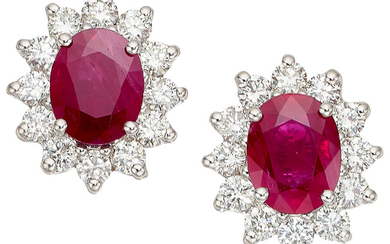 Ruby, Diamond, White Gold Earrings Stones: Oval-shaped rubies weighing...