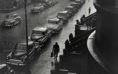 Ruth Orkin (1921-1985) Man in Rain, West 88th Street, New York City