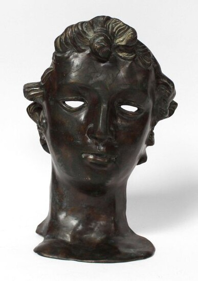 School of the 20th century in the taste of the antique. Head of Apollo. Bronze with brown patina treated in bas-relief. H. 47 cm