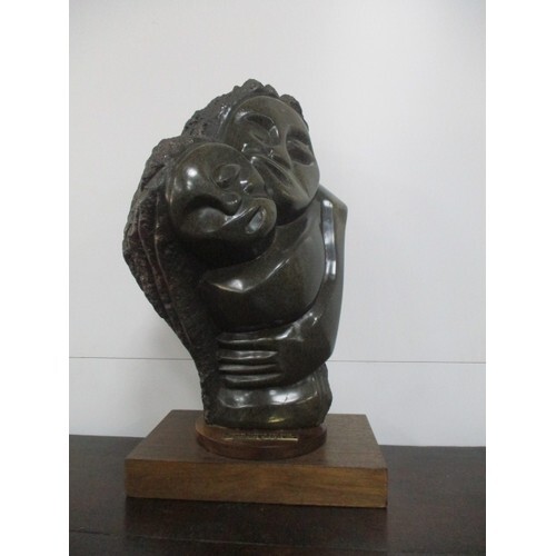 Shona Art - a Fabian Madamombe carved stone sculpture depict...
