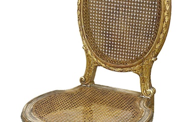 Stuhl im Stil Louis XVI, Frankreich 19. Jh., Holz reich beschnitzt und in Gold gefasst,...