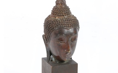 Thai bronze head of Buddha on wood base 9 1/2"H x 3"W x 3 1/4"D