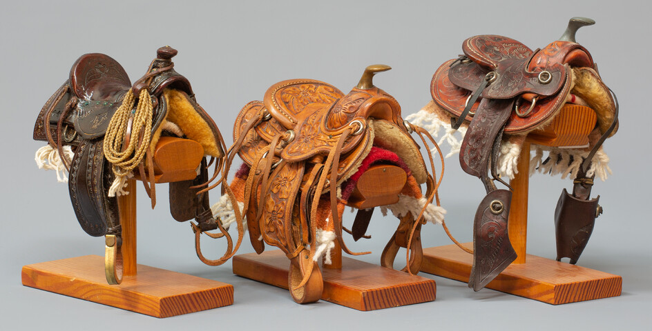 Three Miniature Cowboy Saddles
