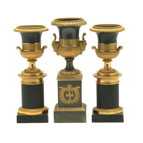 Three Neoclassical Style Bronze Urn Form Garnitures.