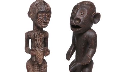Two ancestor figures of carved patinated wood. Luluwa style etc. H. 62 and 75 cm. (2)