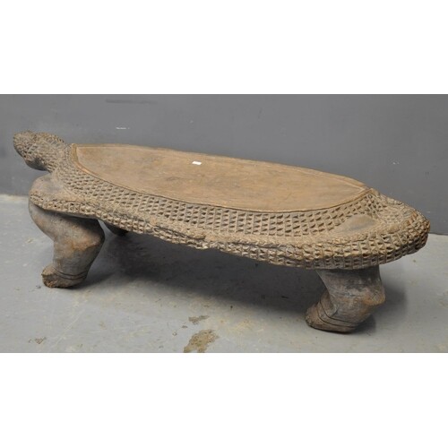 West African carved hardwood low table in the form of a croc...