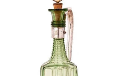 Y AN EARLY VICTORIAN GREEN TINTED GLASS DECANTER IN AN ELECTRO-PLATED FRAME