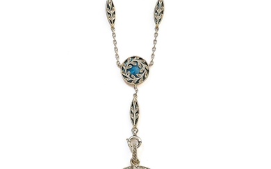 médaillon en émail bleu guilloché et diamants, années 1910 le médaillon circulaire à charnière décoré...