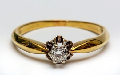 14krt. Gold solitairring, set with a brilliant cut...