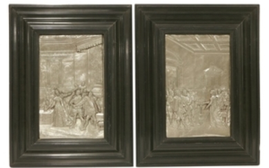 A pair of cast pewter panels