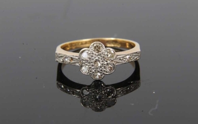 1920s diamond cluster ring with a daisy head cluster of single cut diamonds in platinum setting on 18ct yellow gold shank