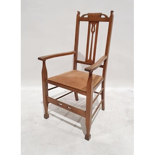 20th century oak carver chair in the Arts & Crafts manner