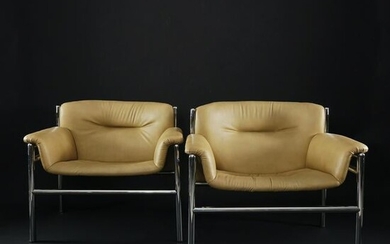 4 leatherette covered chromed steel armchairs