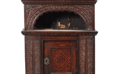 An English oak wall cabinet, circa 1650 and later