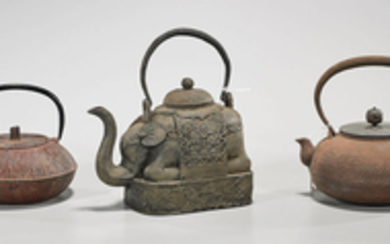 Group of Three Iron Teapots