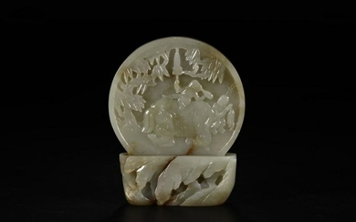 A HETIAN JADE ORNAMENT CARVED IN LAD WITH ELEPHANT