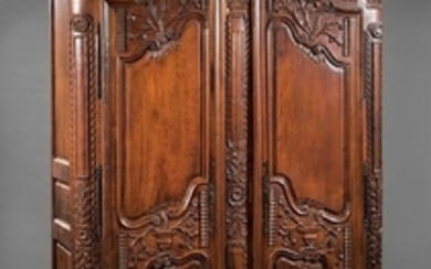 Louis XVI Highly Carved Walnut Armoire