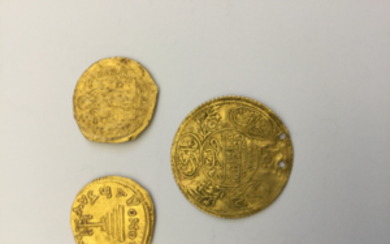 3 monete in oro (una bucata e una falsa)....