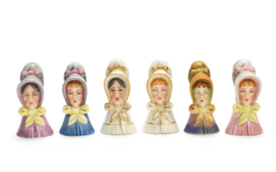 Old Woman and Young Girl: two pairs of Royal Worcester candle extinguishers and two others