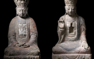 Two stone figures of Guanyin