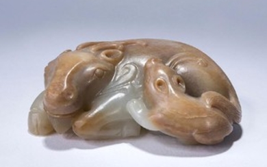 A WHITE JADE CARVING OF TWO BUFFALO