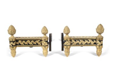 A pair of late 19th century gilt and patinated bronze chenet cast by Bouhon Freres