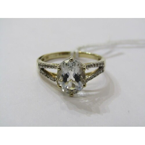 9ct YELLOW GOLD PALE BLUE STONE SOLITAIRE RING, possibly pal...