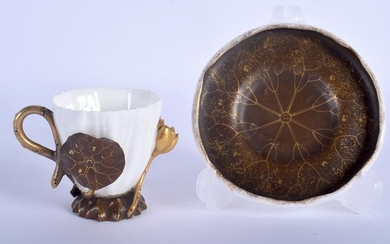 A 19TH CENTURY AESTHETIC MOVEMENT CUP AND SAUCER