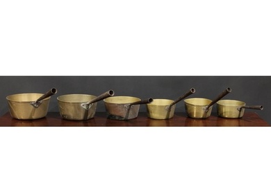 A 19th century harlequin graduated set of six brass and stee...