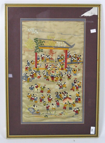 A 20th century Chinese silk embroidery, depicting figures in traditional costumes at a festival