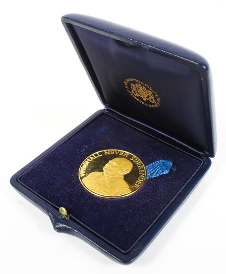 A 22ct gold. Anniversary of Dunkirk commemorative medal coin.