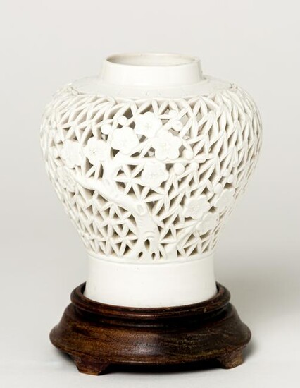 A CHINESE WHITE PORCELAIN OPEN-WORKED MEIPING