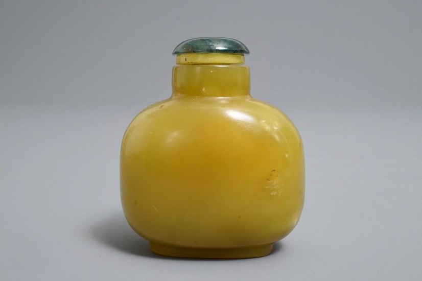 A Chinese yellow jade snuff bottle, 18th C....