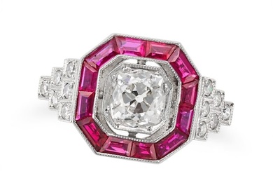 A DIAMOND AND RUBY TARGET RING set with an old cut diamond of 0.99 carats in a border of calibre cut