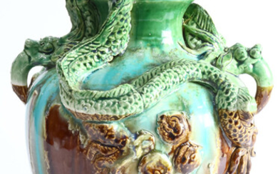 A European majolica dragon urn