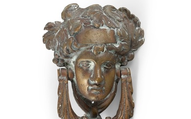 A GEORGIAN STYLE BRASS DOOR KNOCKER IN THE FORM OF A CLASSIC...