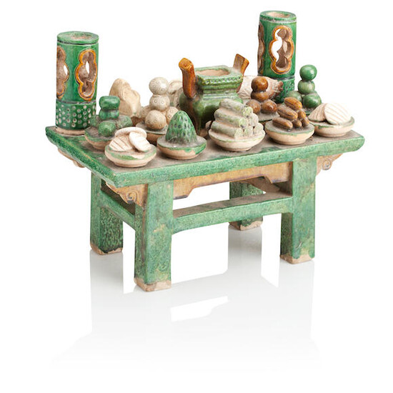 A GREEN GLAZED POTTERY TABLE OFFERING
