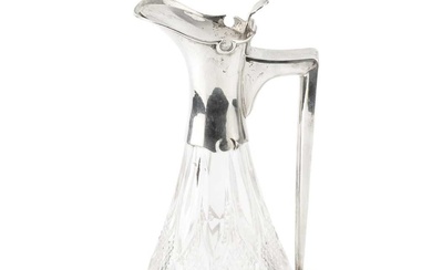 A George V silver mounted cut glass claret jug, the...
