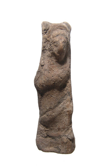 A Greek terracotta figure of a robed goddess