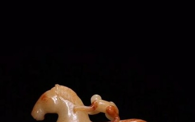 A HETIAN JADE CARVED HORSE SHAPED PENDANT