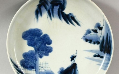 A JAPANESE BLUE AND WHITE PORCELAIN DISH, painted with