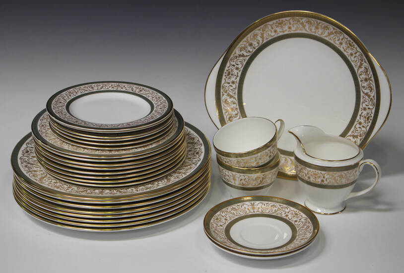 A Minton Aragon pattern bone china part service, comprising eight dinner and dessert plates, cake pl