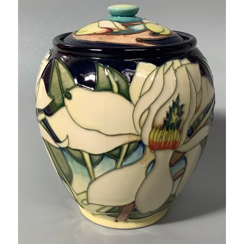 A Moorcroft pottery vase and cover of ovoid form decorated i...