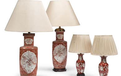 A PAIR OF CHINESE RED AND WHITE ROULEAU PORCELAIN TABLE LAMPS, 19TH/20TH CENTURY