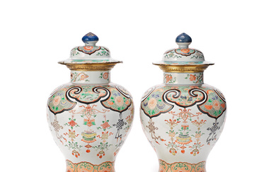 A PAIR OF FAMILLE VERTE VASES AND COVERS Kangxi