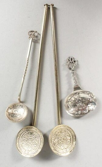A PAIR OF STERLING SILVER GILT SPOONS, a caddy spoon