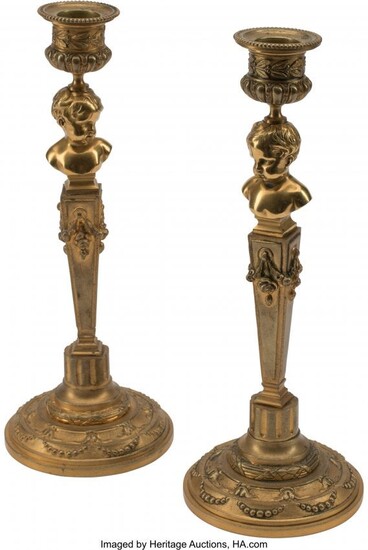 A Pair of French Gilt Bronze Figural Candlestick