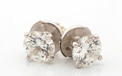 A Pair of Very Fine Diamond Earrings